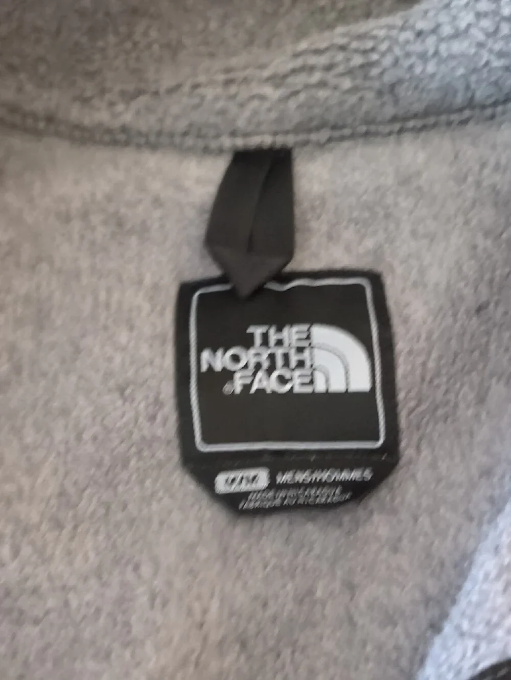 The North Face Light Gray Fleece Jacket with Black Logo Patch